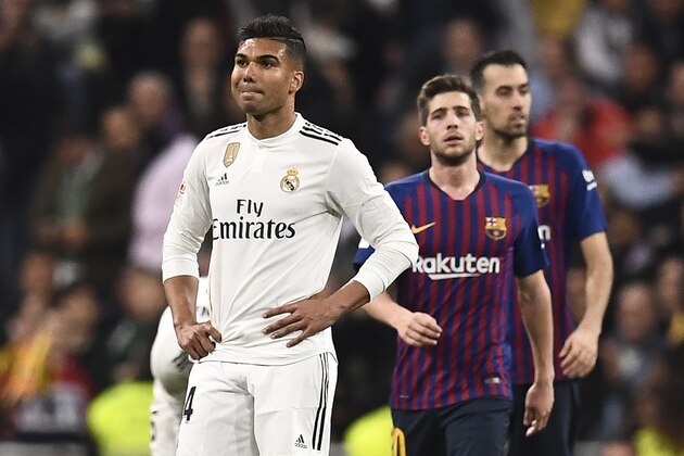 Real Madrid's Brazilian midfielder Casemiro looks on during the Spanish Copa del Rey (King's Cup) semi-final second leg football match between Real Madrid and Barcelona at the Santiago Bernabeu stadium in Madrid on February 27, 2019. (Photo by OSCAR DEL POZO / AFP)        (Photo credit should read OSCAR DEL POZO/AFP/Getty Images)