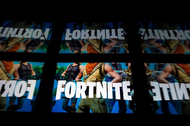 This illustration picture shows the video game Fortnite logo displayed on a tablet in Paris, on February 18, 2019. (Photo by Lionel BONAVENTURE / AFP)        (Photo credit should read LIONEL BONAVENTURE/AFP/Getty Images)