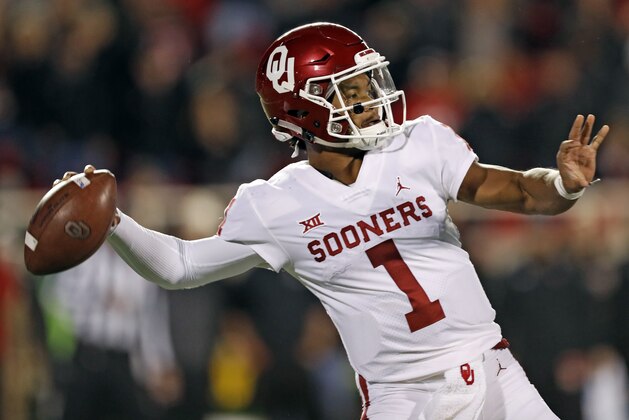 Oklahoma's Kyler Murray (1) passes the ball downfield during the first half of an NCAA college football game against Texas Tech, Saturday, Nov. 3, 2018, in Lubbock, Texas. (AP Photo/Brad Tollefson)