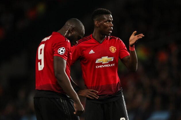 MANCHESTER, ENGLAND - OCTOBER 02: A dejected Romelu Lukaku of Manchester United and Paul Pogba of Manchester United during the Group H match of the UEFA Champions League between Manchester United and Valencia at Old Trafford on October 2, 2018 in Manchester, United Kingdom. (Photo by Matthew Ashton - AMA/Getty Images)