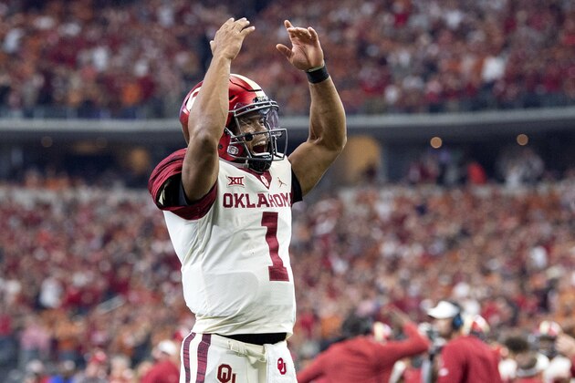 Oklahoma quarterback Kyler Murray (1) celebrates after throwing a touchdown pass to tight end Grant Calcaterra at the end of the first half of the Big 12 Conference championship NCAA college football game against Texas on Saturday, Dec. 1, 2018, in Arlington, Texas. (AP Photo/Jeffrey McWhorter)