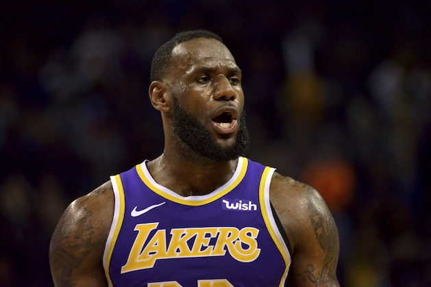 Los Angeles Lakers forward LeBron James reacts in the second half of an NBA basketball game against the Memphis Grizzlies Monday, Feb. 25, 2019, in Memphis, Tenn. (AP Photo/Brandon Dill)
