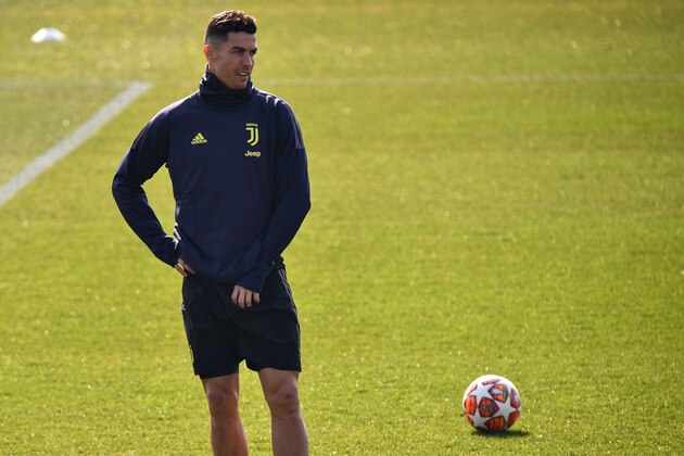 Juventus' Portuguese forward Cristiano Ronaldo looks on during a training session at the Continassa training ground in Turin on February 19, 2019, on the eve of their UEFA Champions League round of 16 first leg football match against Atletico Madrid. (Photo by Marco BERTORELLO / AFP)        (Photo credit should read MARCO BERTORELLO/AFP/Getty Images)