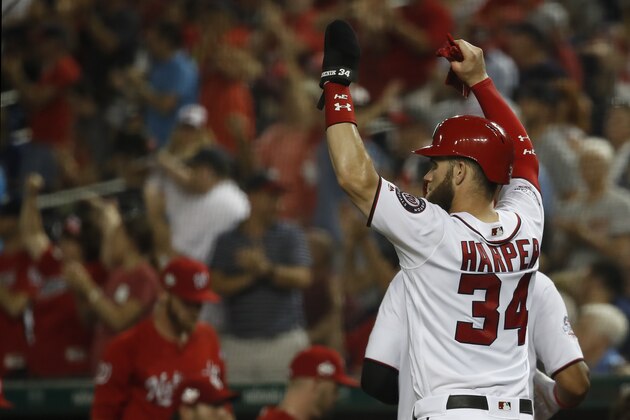 WASHINGTON, DC - SEPTEMBER 05: Bryce Harper #34 of the Washington Nationals celebrates after scoring on an three-run RBI double by Ryan Zimmerman #11 (not pictured) in seventh inning against the St. Louis Cardinals at Nationals Park on September 5, 2018 in Washington, DC. (Photo by Patrick McDermott/Getty Images)