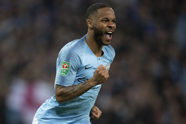 LONDON, ENGLAND - FEBRUARY 24:  Raheem Sterling of Manchester City celebrates scoring the winning penalty during the Carabao Cup Final between Chelsea and Manchester City at Wembley Stadium on February 24, 2019 in London, England.  (Photo by Visionhaus/Getty Images)