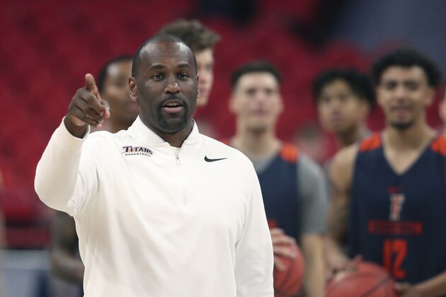 Cal State Fullerton head coach Dedrique Taylor is seen during a practice for an NCAA men's college basketball tournament first-round game, Thursday, March 15, 2018, in Detroit. Cal State Fullerton plays Purdue in the first round on Friday. (AP Photo/Carlos Osorio)