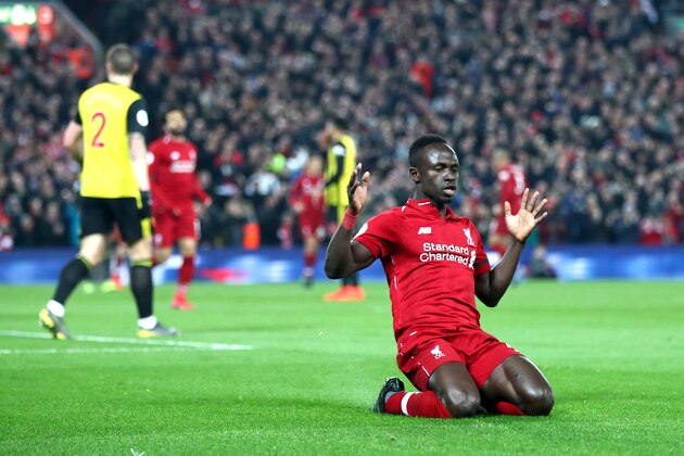 LIVERPOOL, ENGLAND - FEBRUARY 27: Sadio Mane of Liverpool celebrates after scoring his team's first goal during the Premier League match between Liverpool FC and Watford FC at Anfield on February 27, 2019 in Liverpool, United Kingdom. (Photo by Clive Brunskill/Getty Images)