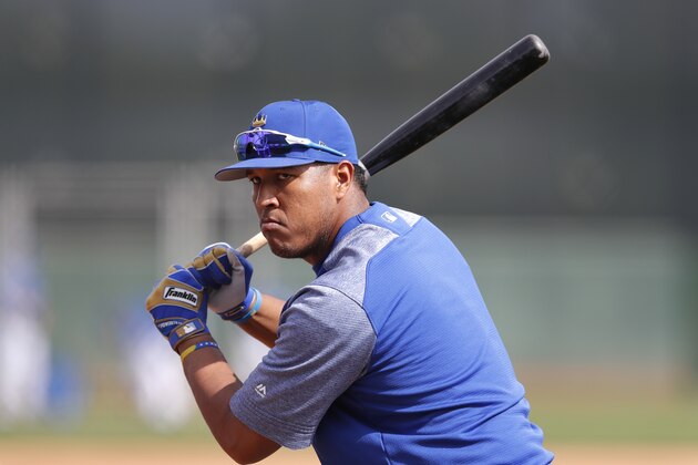 Kansas City Royals catcher Salvador Perez waits to hit in the batting cage during a baseball spring training workout, Saturday, Feb. 17, 2018, in Surprise, Ariz. (AP Photo/Charlie Neibergall)