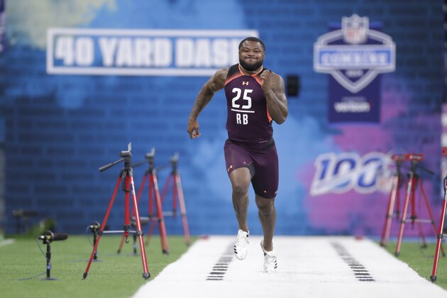 Ohio State running back Mike Weber runs the 40-yard dash at the NFL football scouting combine in Indianapolis, Friday, March 1, 2019. (AP Photo/Michael Conroy)