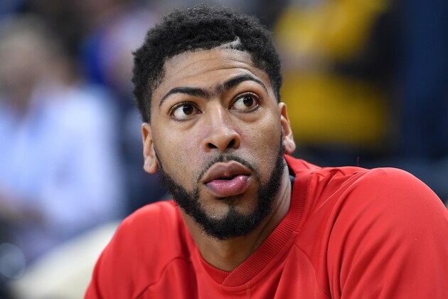 OAKLAND, CA - APRIL 08:  Anthony Davis #23 of the New Orleans Pelicans looks on from the bench against the Golden State Warriors during an NBA Basketball game at ORACLE Arena on April 8, 2017 in Oakland, California. NOTE TO USER: User expressly acknowledges and agrees that, by downloading and or using this photograph, User is consenting to the terms and conditions of the Getty Images License Agreement.  (Photo by Thearon W. Henderson/Getty Images)