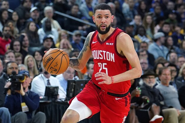 OAKLAND, CA - FEBRUARY 23:  Austin Rivers #25 of the Houston Rockets dribbles the ball against the Golden State Warriors during an NBA basketball game at ORACLE Arena on February 23, 2019 in Oakland, California. NOTE TO USER: User expressly acknowledges and agrees that, by downloading and or using this photograph, User is consenting to the terms and conditions of the Getty Images License Agreement.  (Photo by Thearon W. Henderson/Getty Images)