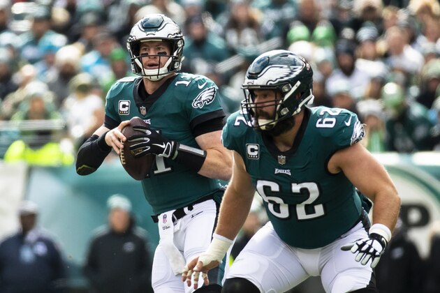 PHILADELPHIA, PA - OCTOBER 21:  Carson Wentz #11 of the Philadelphia Eagles drops back to pass behind Jason Kelce #62 during the first quarter against the Carolina Panthers at Lincoln Financial Field on October 21, 2018 in Philadelphia, Pennsylvania. Carolina defeats Philadelphia 21-17.  (Photo by Brett Carlsen/Getty Images)