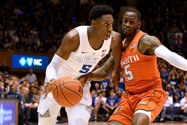 DURHAM, NC - MARCH 02: RJ Barrett #5 of the Duke Blue Devils moves the ball against Zach Johnson #5 of the Miami Hurricanes in the first half at Cameron Indoor Stadium on March 2, 2019 in Durham, North Carolina. (Photo by Lance King/Getty Images)
