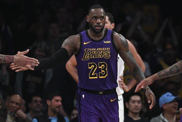 LOS ANGELES, CALIFORNIA - MARCH 01: LeBron James #23 of the Los Angeles Lakers celebrates during the game against the Milwaukee Bucks at Staples Center on March 01, 2019 in Los Angeles, California. NOTE TO USER: User expressly acknowledges and agrees that, by downloading and or using this photograph, User is consenting to the terms and conditions of the Getty Images License Agreement.  (Photo by Kevork Djansezian/Getty Images)