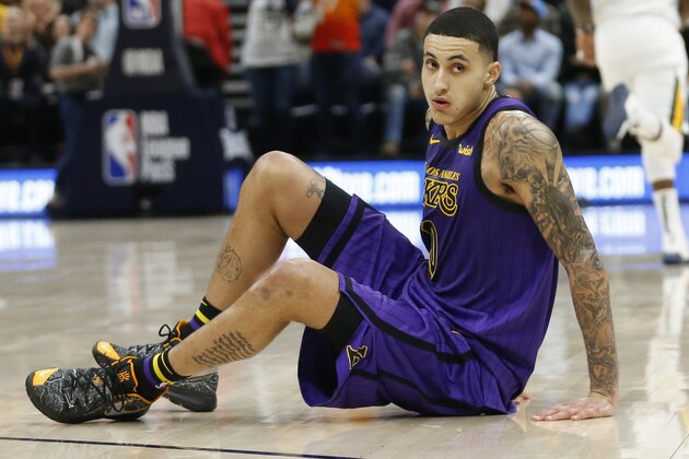 Los Angeles Lakers forward Kyle Kuzma (0) looks up after falling to the court during the first half of an NBA basketball game against the Utah Jazz Friday, Jan. 11, 2019, in Salt Lake City. (AP Photo/Rick Bowmer)
