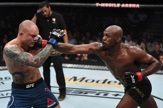 LAS VEGAS, NV - MARCH 02: Jon Jones punches Anthony Smith in their UFC light heavyweight championship bout during the UFC 235 event at T-Mobile Arena on March 2, 2019 in Las Vegas, Nevada.  (Photo by Jeff Bottari/Zuffa LLC/Zuffa LLC)
