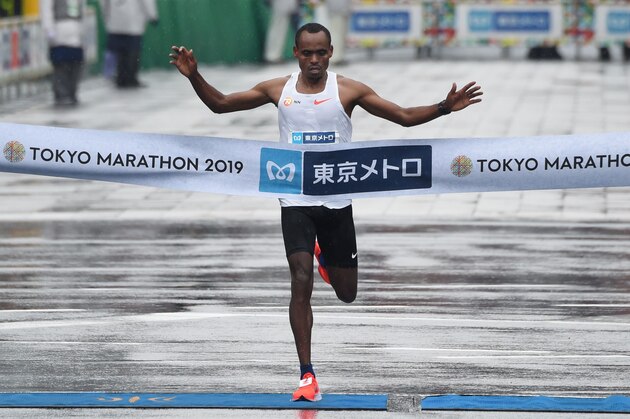 Birhanu Legese of Ethiopia crosses the finish line at the Tokyo Marathon in Tokyo on March 3, 2019. (Photo by Kazuhiro NOGI / AFP)        (Photo credit should read KAZUHIRO NOGI/AFP/Getty Images)