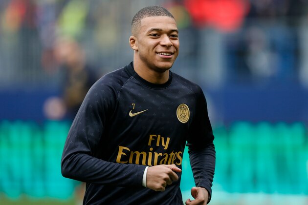 Paris Saint-Germain's French forward Kylian Mbappe warms up prior to the  French L1 football match between Caen (SMC) and Paris Saint-Germain (PSG) at the Michel d'Ornano Satdium in Caen, northwestern France, on March 2, 2019. (Photo by CHARLY TRIBALLEAU / AFP)        (Photo credit should read CHARLY TRIBALLEAU/AFP/Getty Images)