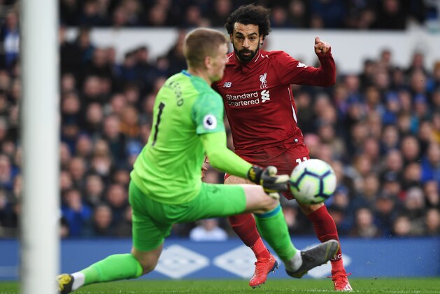 LIVERPOOL, ENGLAND - MARCH 03:  Mohamed Salah of Liverpool is foiled by Jordan Pickford of Everton as he saves during the Premier League match between Everton FC and Liverpool FC at Goodison Park on March 03, 2019 in Liverpool, United Kingdom. (Photo by Shaun Botterill/Getty Images)
