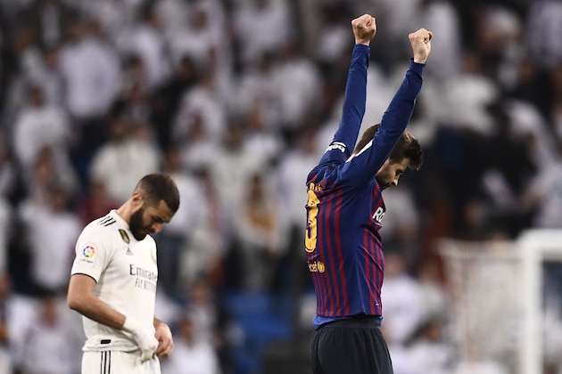 Barcelona's Spanish defender Gerard Pique celebrates during the Spanish league football match between Real Madrid CF and FC Barcelona at the Santiago Bernabeu stadium in Madrid on March 2, 2019. (Photo by OSCAR DEL POZO / AFP)        (Photo credit should read OSCAR DEL POZO/AFP/Getty Images)