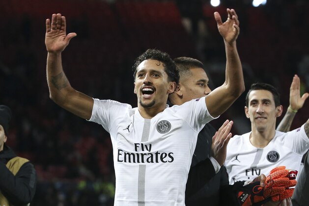 MANCHESTER, ENGLAND - FEBRUARY 12: Marquinhos of PSG celebrates the victory following the UEFA Champions League Round of 16 First Leg match between Manchester United (Man U) and Paris Saint-Germain (PSG) at Old Trafford stadium on February 12, 2019 in Manchester, England. (Photo by Jean Catuffe/Getty Images)