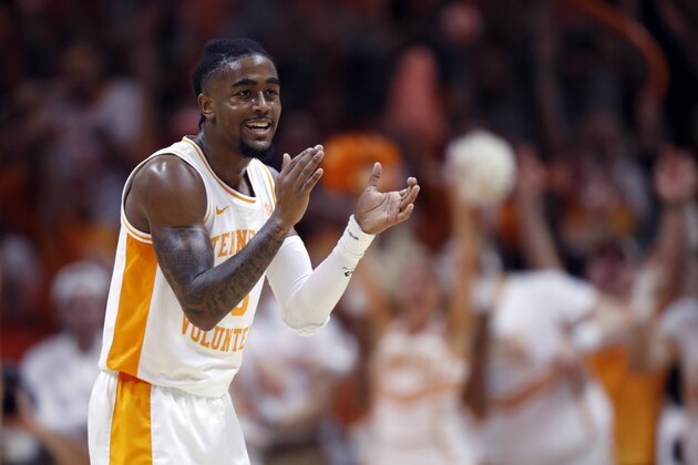 Tennessee guard Jordan Bone (0) reacts to a shot during the first half of an NCAA college basketball game against Kentucky Saturday, March 2, 2019, in Knoxville, Tenn. (AP Photo/Wade Payne)