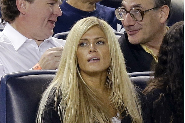 Retired wrestler Torrie Wilson sits in New York Yankee's Alex Rodriguez's private box during the Yankees baseball game against the Los Angeles Angels, Monday, Aug. 12, 2013, in New York. (AP Photo/Kathy Willens)
