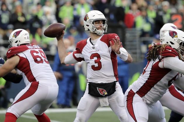 Arizona Cardinals quarterback Josh Rosen drops back to pass against the Seattle Seahawks during the second half of an NFL football game, Sunday, Dec. 30, 2018, in Seattle. (AP Photo/Ted S. Warren)