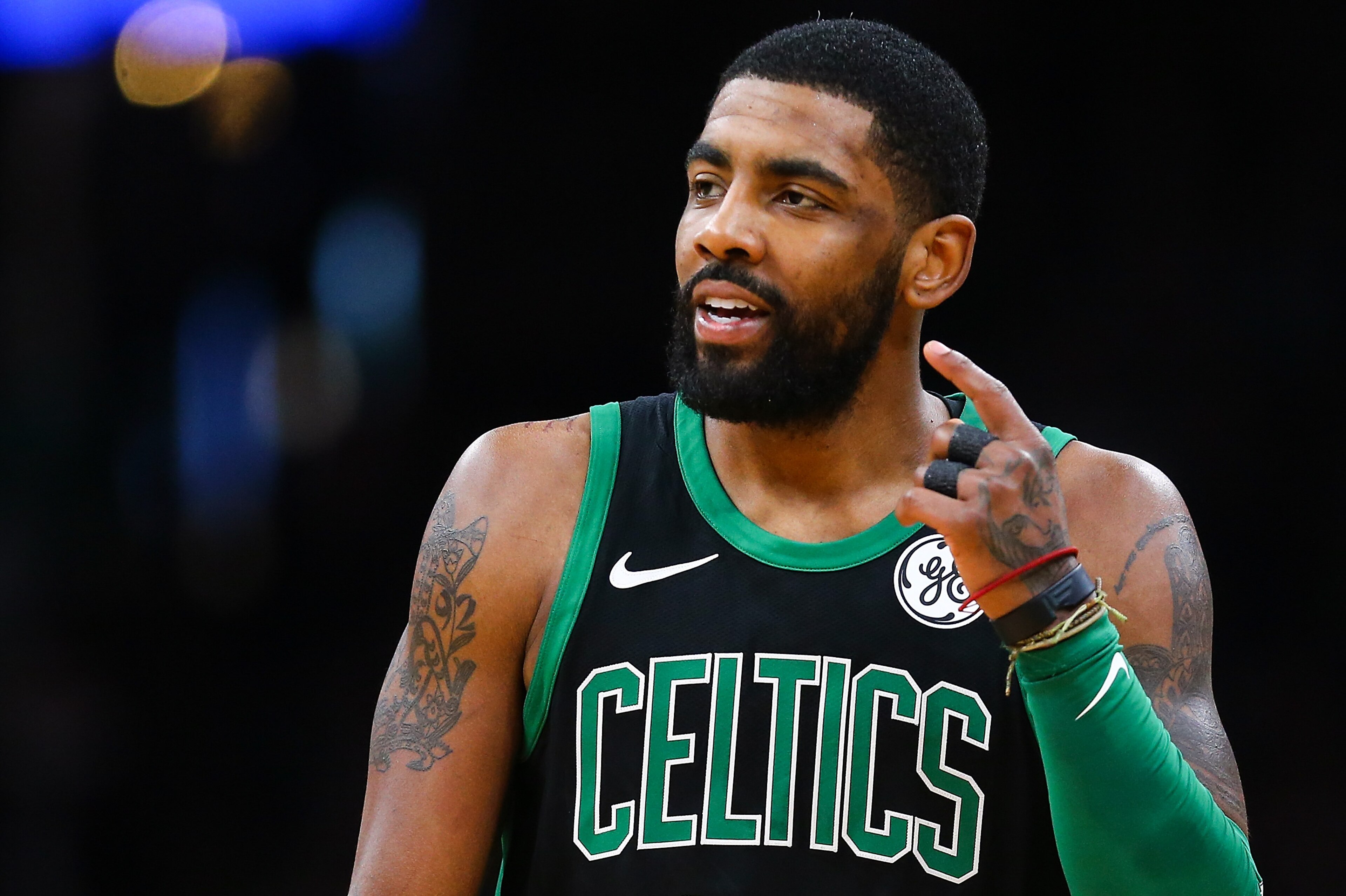BOSTON, MA - MARCH 03:  Kyrie Irving #11 of the Boston Celtics reacts during a game against the Houston Rockets at TD Garden on March 3, 2019 in Boston, Massachusetts. NOTE TO USER: User expressly acknowledges and agrees that, by downloading and or using this photograph, User is consenting to the terms and conditions of the Getty Images License Agreement. (Photo by Adam Glanzman/Getty Images)