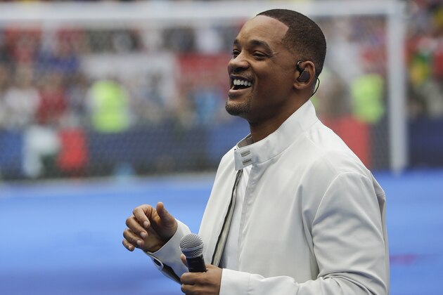 FILE - In this July 15, 2018, file photo, singer and actor Will Smith performs during the closing ceremony prior to the final match between France and Croatia at the 2018 soccer World Cup in the Luzhniki Stadium in Moscow, Russia. The star on Wednesday, Oct. 10, revealed the first poster of Disney's remake of