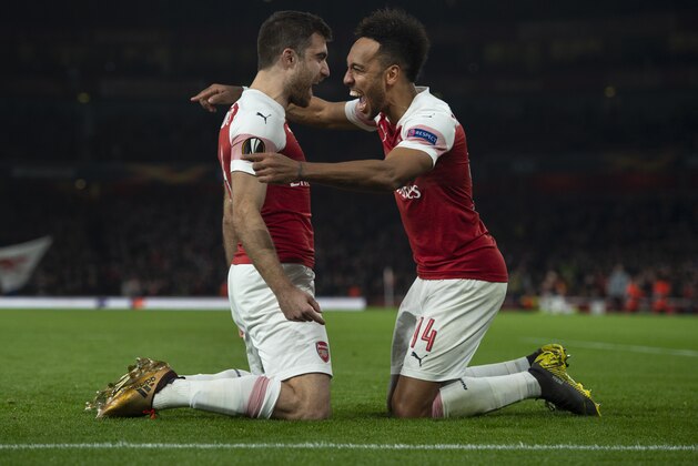 LONDON, ENGLAND - FEBRUARY 21: Pierre-Emerick Aubameyang of Arsenal celebrates with goalscorer Sokratis Papastathopoulos during the UEFA Europa League Round of 32 Second Leg match between Arsenal and BATE Borisov at England on February 21, 2019 in London, United Kingdom. (Photo by Visionhaus/Getty Images)