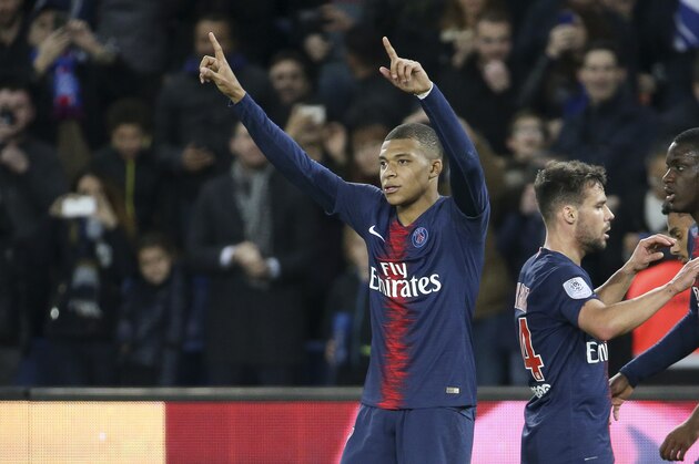 PARIS, FRANCE - FEBRUARY 23: Kylian Mbappe of PSG celebrates his second goal during the French Ligue 1 match between Paris Saint-Germain (PSG) and Nimes Olympique at Parc des Princes stadium on February 23, 2019 in Paris, France. (Photo by Jean Catuffe/Getty Images)