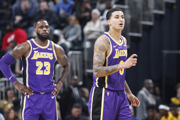 INDIANAPOLIS, IN - FEBRUARY 05: Kyle Kuzma #0 and LeBron James #23 of the Los Angeles Lakers look on during the game against the Indiana Pacers at Bankers Life Fieldhouse on February 5, 2019 in Indianapolis, Indiana. The Pacers won 136-94. NOTE TO USER: User expressly acknowledges and agrees that, by downloading and or using the photograph, User is consenting to the terms and conditions of the Getty Images License Agreement. (Photo by Joe Robbins/Getty Images)