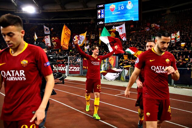 ROME, ITALY - FEBRUARY 12: Nicolo Zaniolo of AS Roma celebrates scoring his sides first goal with his team during the UEFA Champions League Round of 16 First Leg match between AS Roma and FC Porto at Stadio Olimpico on February 12, 2019 in Rome, . (Photo by Chris Brunskill/Fantasista/Getty Images)