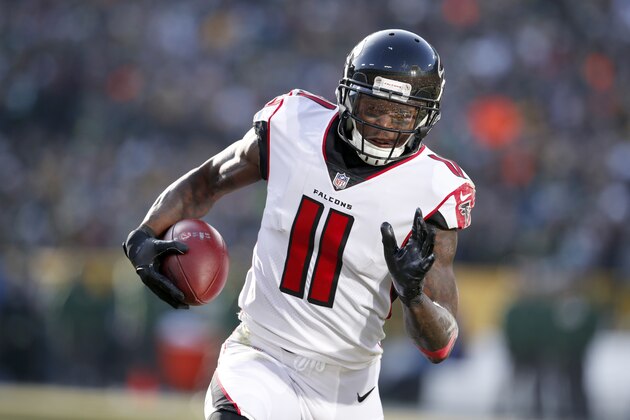 Atlanta Falcons wide receiver Julio Jones (11) runs with the ball after a catch for a touchdown against the Green Bay Packers during an NFL football game Sunday, Dec. 9, 2018, in Green Bay, Wis. The Packers won 34-20. (Jeff Haynes/AP Images for Panini)