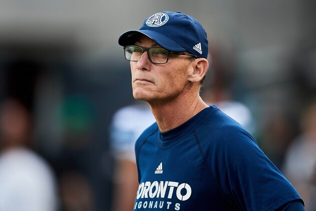 REGINA, SK - JUNE 15: Head coach Marc Trestman of the Toronto Argonauts on the field during pregame warmup for the game between the Toronto Argonauts and Saskatchewan Roughriders at Mosaic Stadium on June 15, 2018 in Regina, Canada. (Photo by Brent Just/Getty Images)