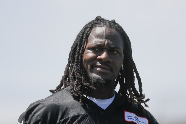 FILE - In this May 23, 2017, file photo, Cincinnati Bengals cornerback Adam Jones walks the field during organized team activities, in Cincinnati. Bengals cornerback Adam