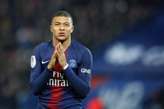 PSG's Kylian Mbappe reacts during the French League One soccer match between Paris Saint Germain and Montpellier at the Parc des Princes stadium in Paris, France, Wednesday, Feb. 20, 2019. (AP Photo/Francois Mori)