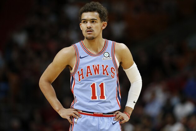 MIAMI, FLORIDA - MARCH 04:  Trae Young #11 of the Atlanta Hawks looks on against the Miami Heat during the first half at American Airlines Arena on March 04, 2019 in Miami, Florida. NOTE TO USER: User expressly acknowledges and agrees that, by downloading and or using this photograph, User is consenting to the terms and conditions of the Getty Images License Agreement. (Photo by Michael Reaves/Getty Images)
