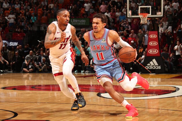 MIAMI, FL - MARCH 4: Trae Young #11 of the Atlanta Hawks drives to the basket against the Miami Heat on March 4, 2019 at American Airlines Arena in Miami, Florida. NOTE TO USER: User expressly acknowledges and agrees that, by downloading and or using this Photograph, user is consenting to the terms and conditions of the Getty Images License Agreement. Mandatory Copyright Notice: Copyright 2019 NBAE (Photo by Issac Baldizon/NBAE via Getty Images)