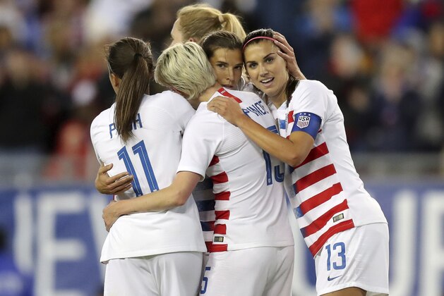 United States' Tobin Heath, second from right, is congratulated on her goal by Mallory Pugh (11), Megan Rapinoe and Alex Morgan (13) during the first half of a SheBelieves Cup soccer match against Brazil Tuesday, March 5, 2019, in Tampa, Fla. (AP Photo/Mike Carlson)