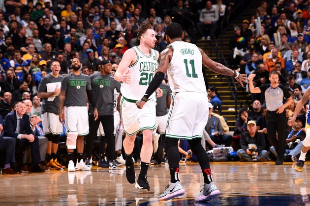 OAKLAND, CA - MARCH 5:  Gordon Hayward #20 hi-fives Kyrie Irving #11 of the Boston Celtics on March 5, 2019 at ORACLE Arena in Oakland, California. NOTE TO USER: User expressly acknowledges and agrees that, by downloading and or using this photograph, user is consenting to the terms and conditions of Getty Images License Agreement. Mandatory Copyright Notice: Copyright 2019 NBAE (Photo by Noah Graham/NBAE via Getty Images)