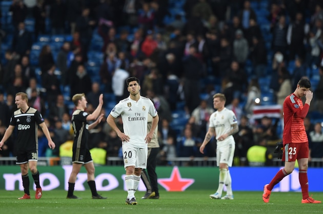 MADRID, SPAIN - MARCH 05: Marco Asensio of Real Madrid shows his disappointment after Ajax beat Real Madrid in the UEFA Champions League Round of 16 Second Leg match between Real Madrid and Ajax at Bernabeu on March 05, 2019 in Madrid, Spain. (Photo by Denis Doyle/Getty Images)