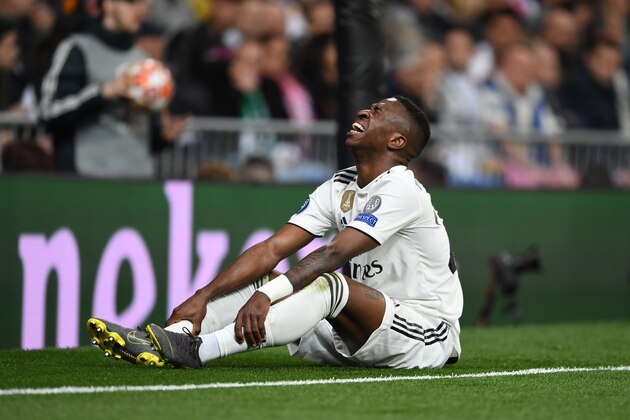 MADRID, SPAIN - MARCH 05: Vinicius Junior of Real Madrid lies injured during the UEFA Champions League Round of 16 Second Leg match between Real Madrid and Ajax at Bernabeu on March 05, 2019 in Madrid, Spain. (Photo by Etsuo Hara/Getty Images)