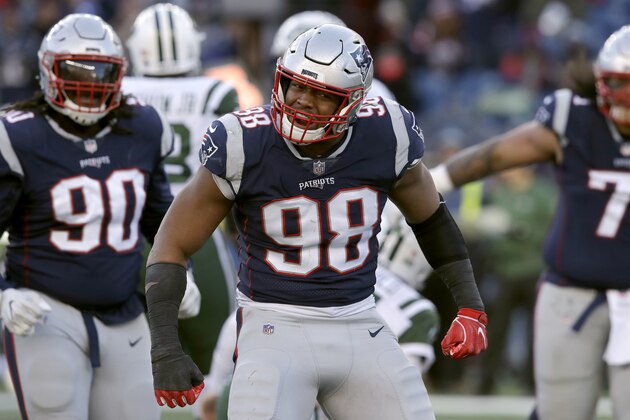 New England Patriots defensive end Trey Flowers reacts after sacking New York Jets quarterback Sam Darnold during the second half of an NFL football game, Sunday, Dec. 30, 2018, in Foxborough, Mass. (AP Photo/Charles Krupa)