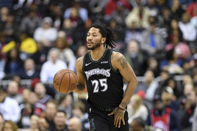 Minnesota Timberwolves guard Derrick Rose (25) dribbles the ball during the first half of an NBA basketball game against the Washington Wizards, Sunday, March 3, 2019, in Washington. (AP Photo/Nick Wass)