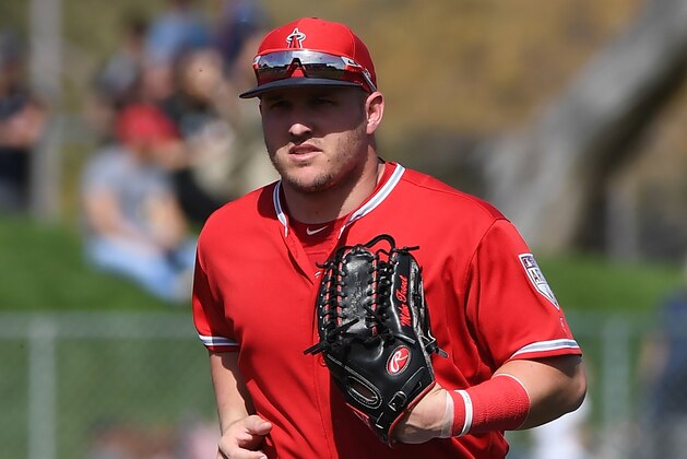 TEMPE, AZ - MARCH 01:  Mike Trout #27 of the Los Angeles Angels of Anaheim runs into the dugout from center field during a spring training game against the Kansas City Royals at Tempe Diablo Stadium on March 1, 2019 in Tempe, Arizona.  (Photo by Norm Hall/Getty Images)