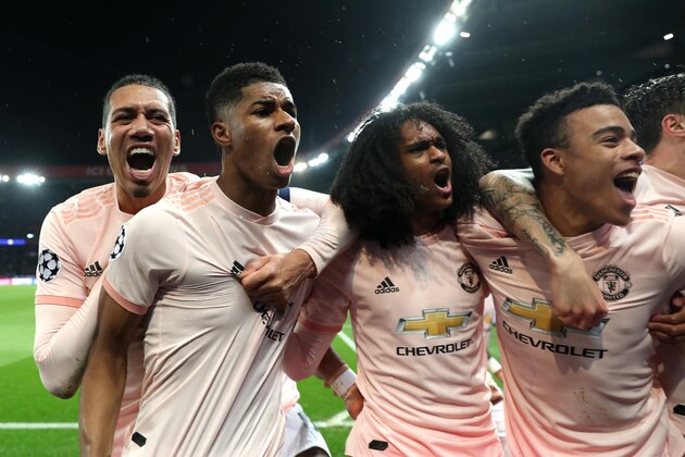 PARIS, FRANCE - MARCH 06: Marcus Rashford of Manchester United celebrates after scoring his sides third goal with teammates during the UEFA Champions League Round of 16 Second Leg match between Paris Saint-Germain and Manchester United at Parc des Princes on March 06, 2019 in Paris, . (Photo by Julian Finney/Getty Images)