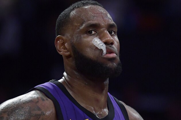 Los Angeles Lakers forward LeBron James paues during the closing seconds of the team's NBA basketball game against the Milwaukee Bucks on Friday, March 1, 2019, in Los Angeles. The Bucks won 131-120. (AP Photo/Mark J. Terrill)