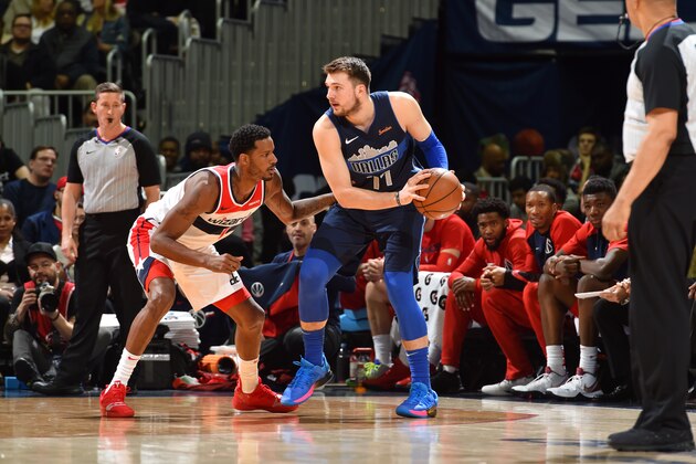 WASHINGTON, DC -  MARCH 6:  Luka Doncic #77 of the Dallas Mavericks handles the ball against the Washington Wizards on March 6, 2019 at Capital One Arena in Washington, DC. NOTE TO USER: User expressly acknowledges and agrees that, by downloading and or using this Photograph, user is consenting to the terms and conditions of the Getty Images License Agreement. Mandatory Copyright Notice: Copyright 2019 NBAE (Photo by Jesse D. Garrabrant/NBAE via Getty Images)